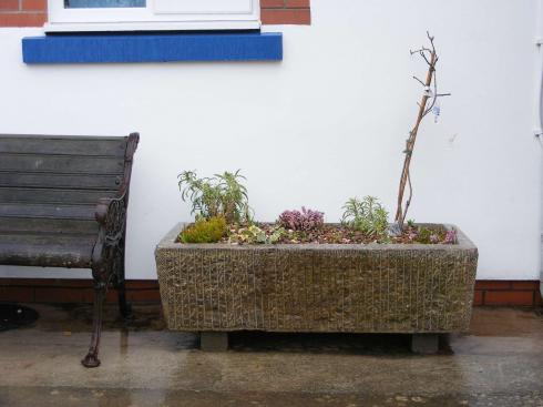 Old stone trough for Coxley Primary School