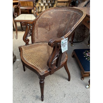 Antique Cane Upholstered Carved Mahogany Chair