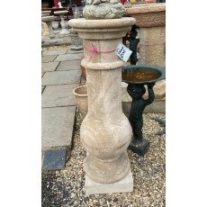 Natural carved stone plinth