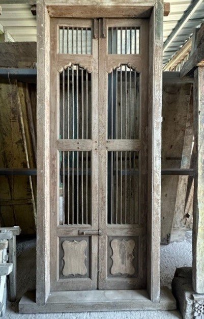 Pair of Tall Teak Metal Bar Doors