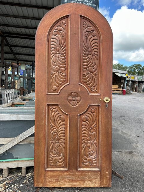 Reclaimed Heavily Carved Iroko Arched Front Door