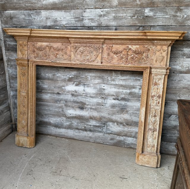 A Reclaimed Stripped Pine Neoclassical Carved Fire Surround