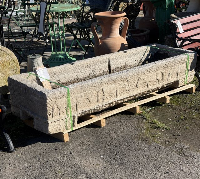 A Fabulous Carved Limestone Horse Trough