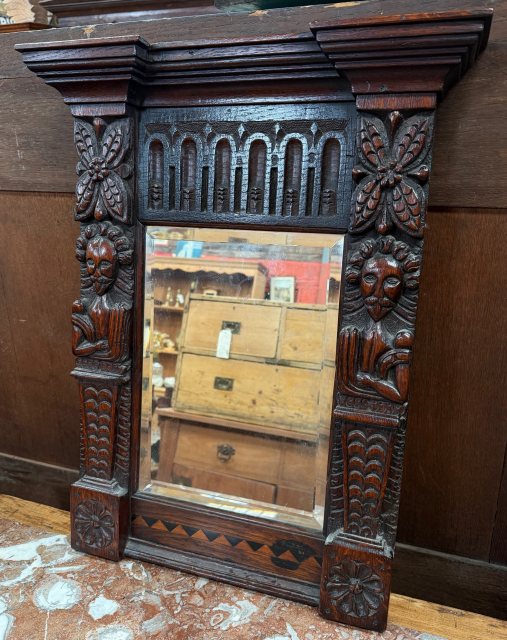 An Interesting 17th Century Carved Oak Mirror