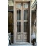 Pair of Tall Teak Metal Bar Doors