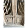 Pair of Tall Teak Metal Bar Doors