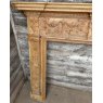 A Reclaimed Stripped Pine Neoclassical Carved Fire Surround