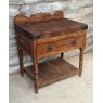A Large Butchers Block On Stand