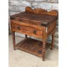 A Large Butchers Block On Stand