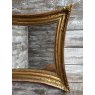 A Fabulous "Squashed" Gilded Wall Mirror c1900