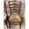 A Set Of 6 Rush Seated Ladder Back Oak Dining Chairs