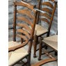 A Set Of 6 Rush Seated Ladder Back Oak Dining Chairs