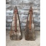 An Unusual Pair Of Iron Mounted Oak Pillar Caps
