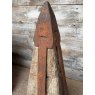 An Unusual Pair Of Iron Mounted Oak Pillar Caps