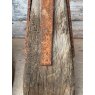 An Unusual Pair Of Iron Mounted Oak Pillar Caps