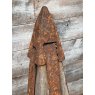An Unusual Pair Of Iron Mounted Oak Pillar Caps