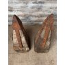 An Unusual Pair Of Iron Mounted Oak Pillar Caps